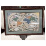 Framed cross-stitch map resembles kits produced
