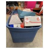 Tote full of porcelain dolls different sizes