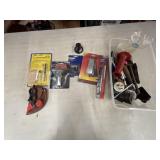 Small tote full of mixed items tools