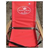 This red Caribbean Joe folding beach chair.