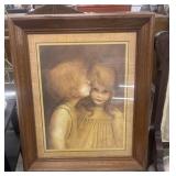 Vintage "Little Kiss" framed print features the