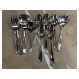 Assorted mix of stainless steel flatware