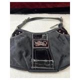 XOXO black vinyl hobo shoulder bag features a