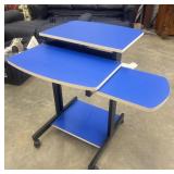 Techni Mobili compact computer cart with a blue