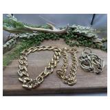 3 Gold Toned Necklaces And Bracelet.