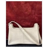Off white Liz Claiborne shoulder bag features a