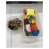 Small containers full of kids toys