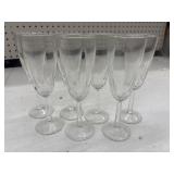 7 clear champagne flutes feature a distinct