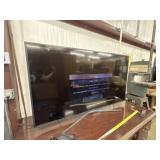 65" Samsung flat screen TV with remote. Works