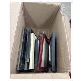 Box full of different size picture frames