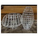 A clear fruit bowl and a clear crystal dish