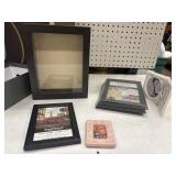 Shoe box full of different picture frames