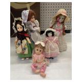 A collection features vintage collectible dolls 5