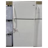 Whirlpool top-freezer refrigerator in white.