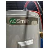 Pallet of three water heaters. Ao Smith.