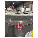 Pallet of three water heaters. Rheem plus