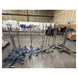 LARGE BUNDLE IV POLES. 4 WITH BLUE ROLLING BASES