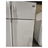 Frigidaire top-freezer refrigerator. Fridge door