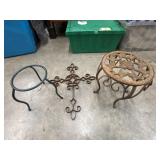 1 vintage-style cast iron plant stand and a metal