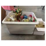 Tote full of Christmas ornaments.