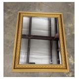 Rectangular mirror in gold tone frame.