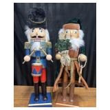 2 wooden holiday nutcracker figures