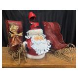 This metal Santa Claus decoration With 2 red