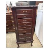 Cherry wood Powell jewelry armoire features 8
