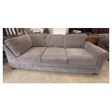 Grey upholstered couch 3 seater is a Crate &