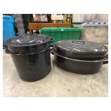 Black speckled enamel roaster pan with inserts.