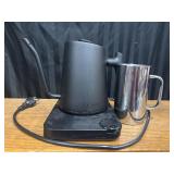 Greater Goods electric kettle and mug.