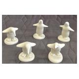 Snow babies "Parade of Penguins" figurines.