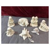 7 pc. hooded snowsuits often depicted with winter