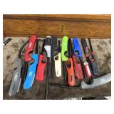 Bundle of lighters and 2 flashlights.