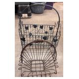 A teal blue magazine rack and a rustic brown