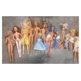 Box full of Barbie and baby dolls some from the