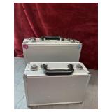 2 pc. Silver aluminum storage case features