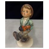 Goebel Hummel figurine titled "Happy Traveler"
