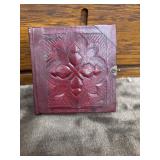 Victorian leather-bound photo album with tintype