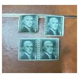 FOUR 1968 United States 1-cent postage stamps.
