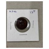 Lincoln Wheat Penny in a protective cardboard