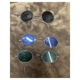 Vintage-style sunglasses feature antique-inspired