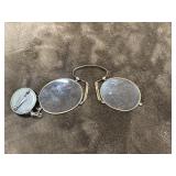 Antique pince-nez spectacles, likely dating to