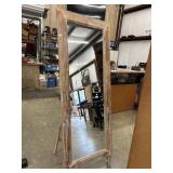 Rustic full-length floor mirror features a thick,