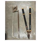 Hand saw and limb cutter.