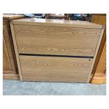 Hon oak laminate lateral filing cabinet.