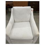 White Armchaito swivel chair, rounded arms and a