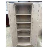 Beige Rubbermaid storage cabinet