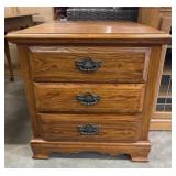 Solid oak three-drawer nightstand