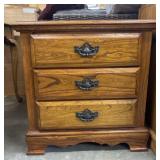 Solid oak three-drawer nightstand